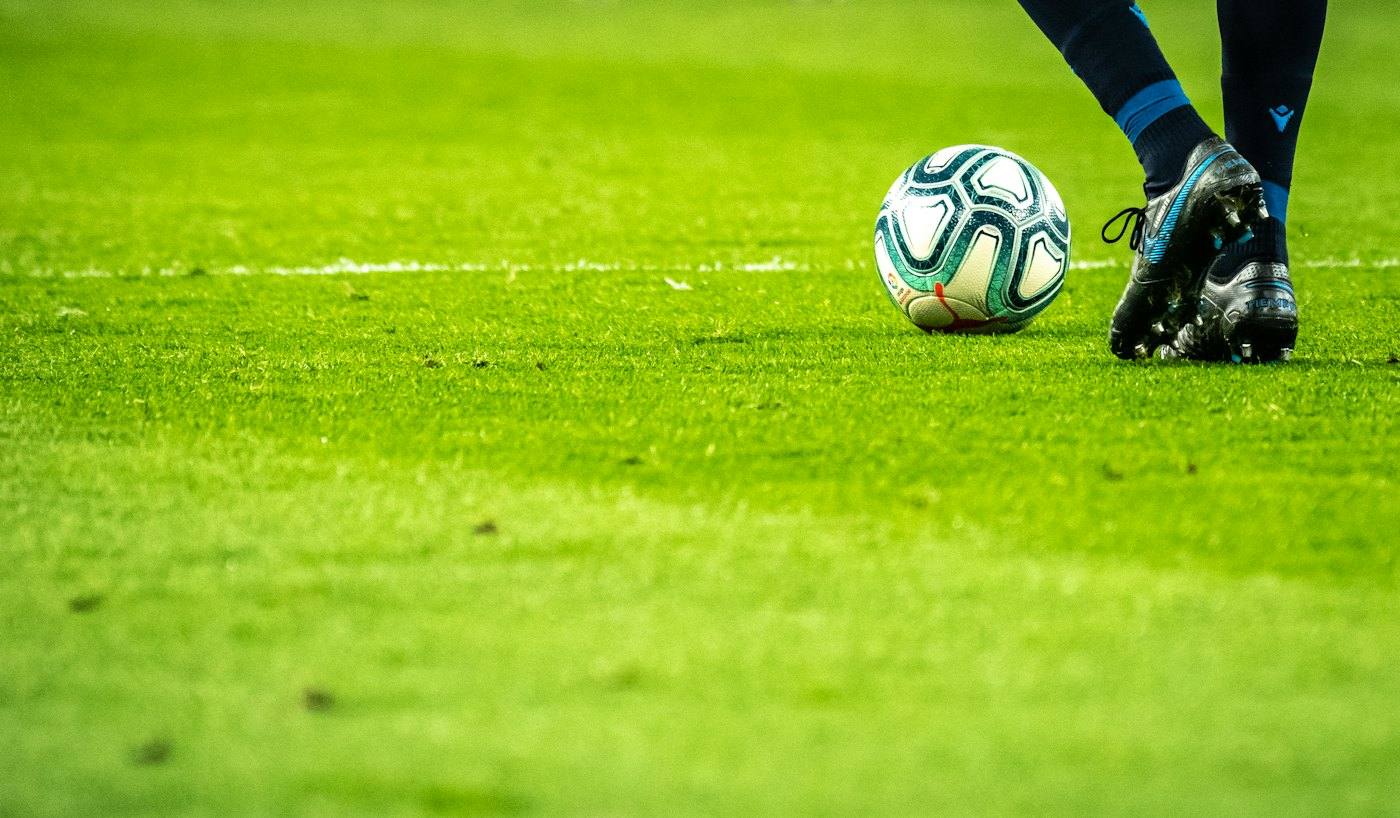 Teen playing soccer